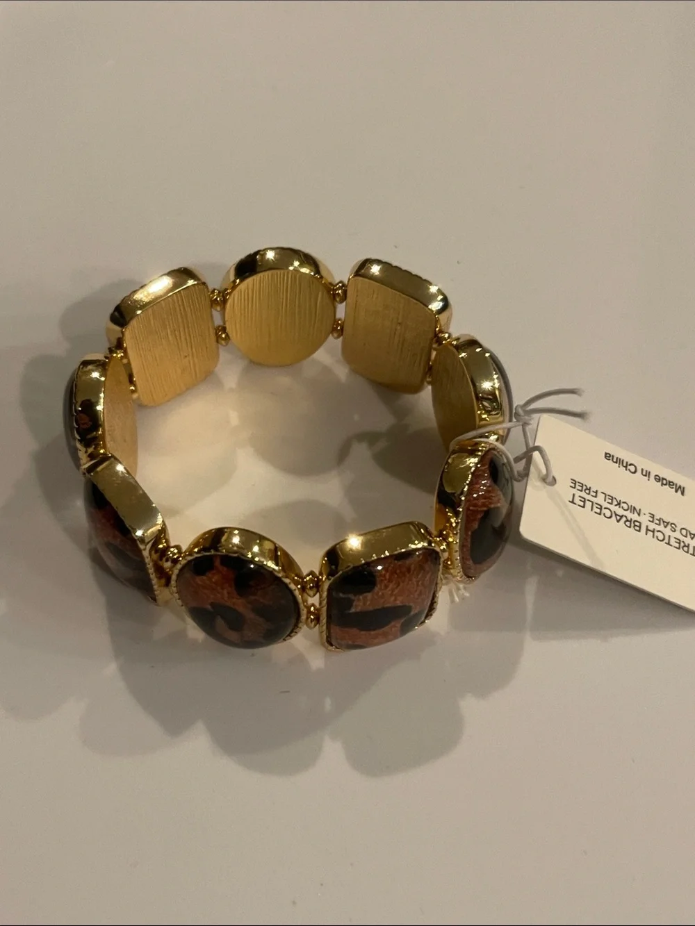 Gold-Tone Bracelet with Brown Leopard-Print Accents - stretchy bracelet